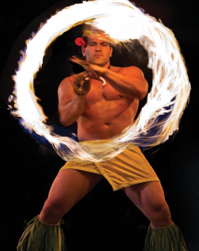 A fire dancer performing at the Waikiki Starlight luau