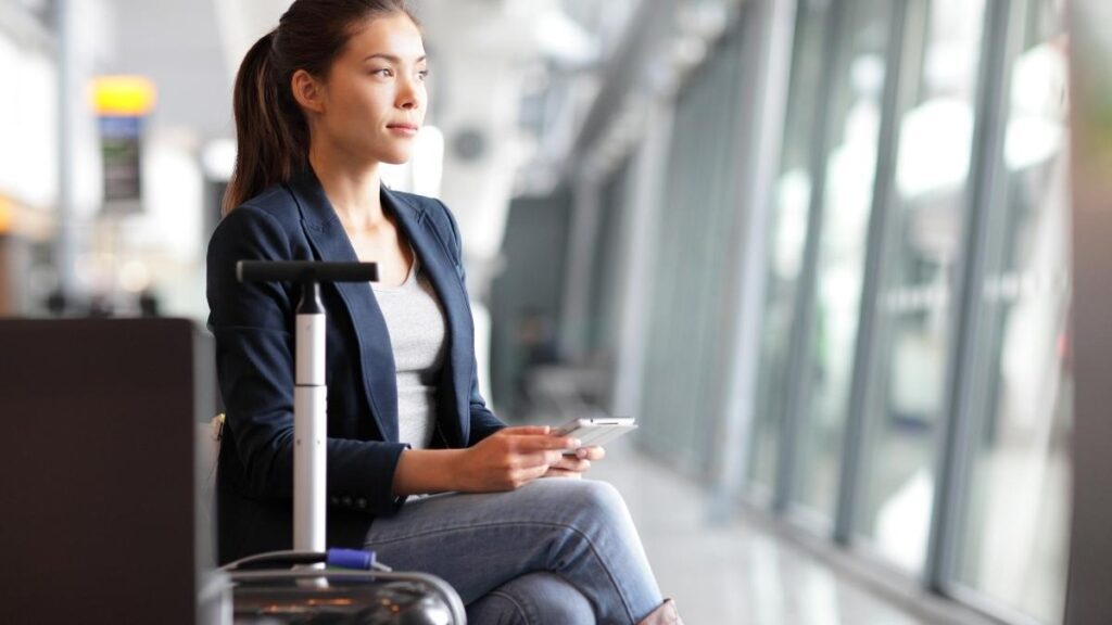 woman at airport waiting