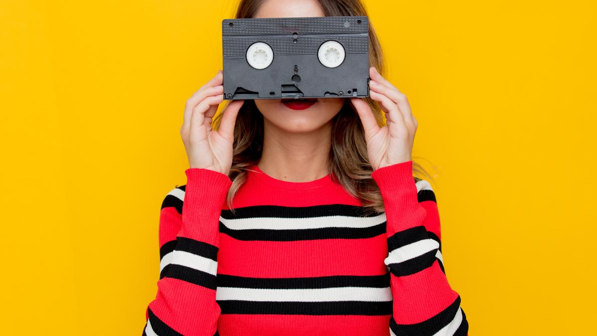 woman with vhs tape