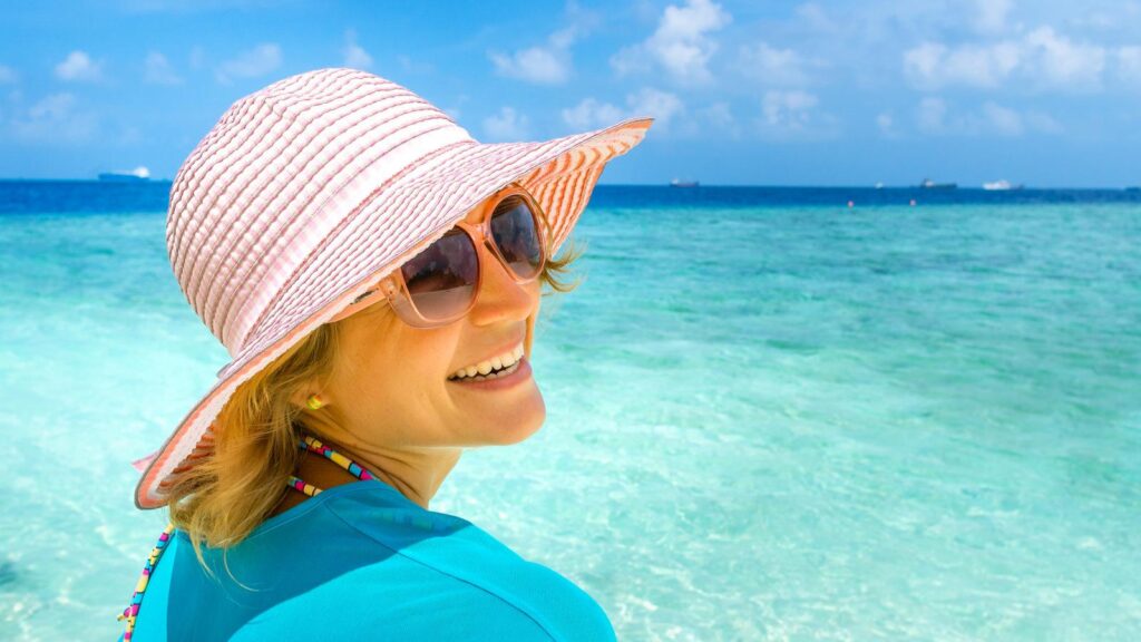 happy woman smiling on beach
