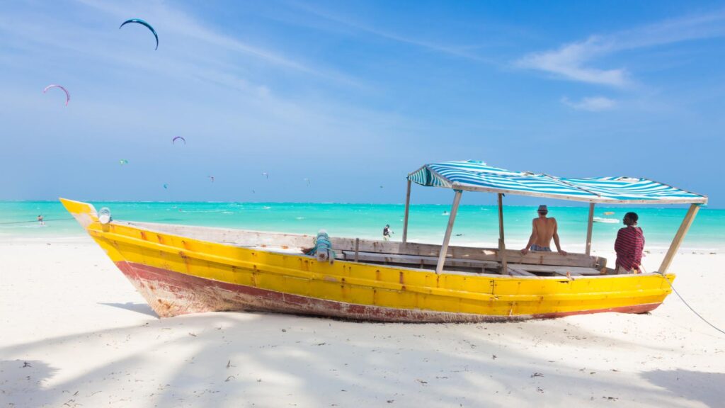 yellow boat on beach in Tanzania