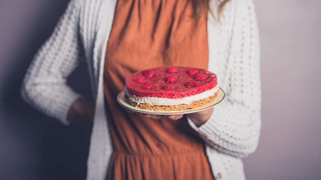 Vintage woman holding cake