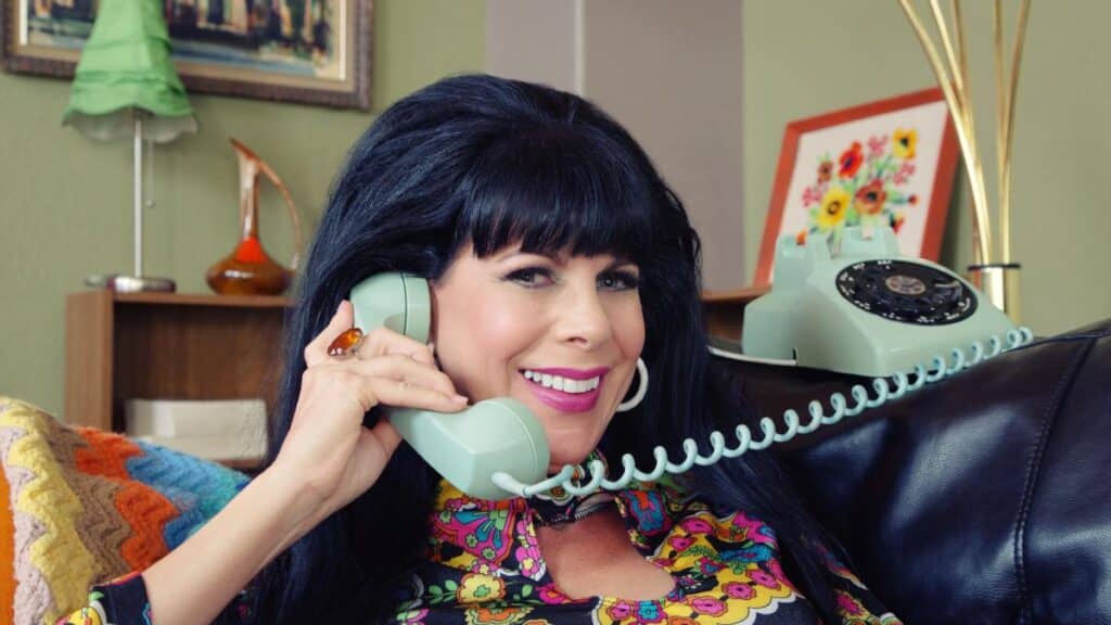 retro woman on rotary phone