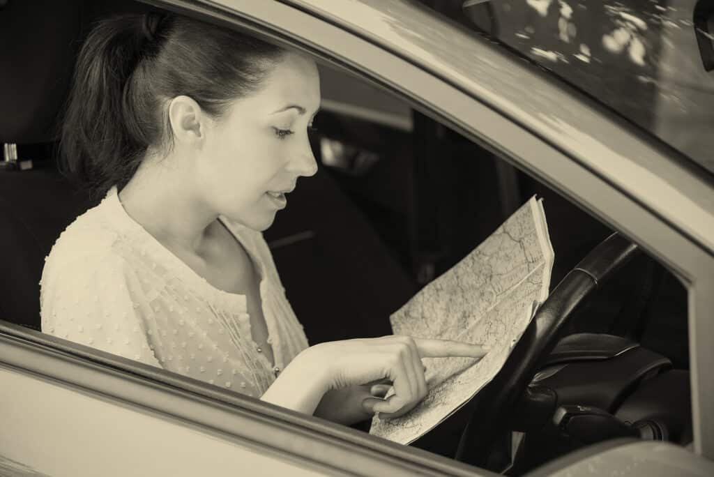 Woman looking at map