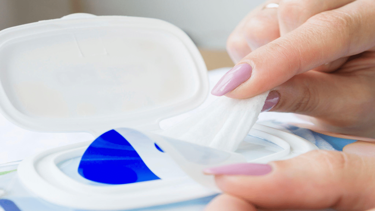 Evgen_Prozhyrko - Baby wet wipes in a woman's hand.