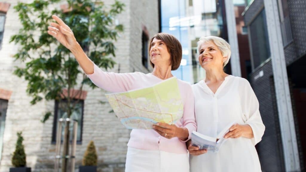 two older women with maps