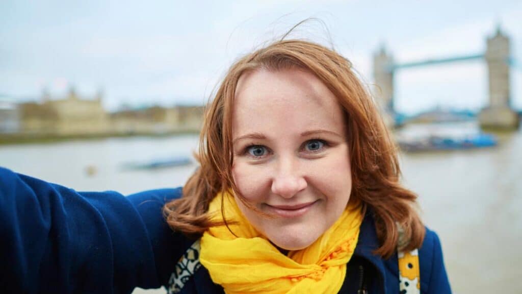 woman tourist yellow scarf