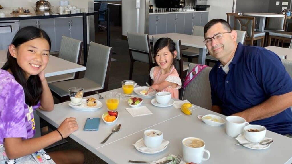 Rodney and girls at airport lounge