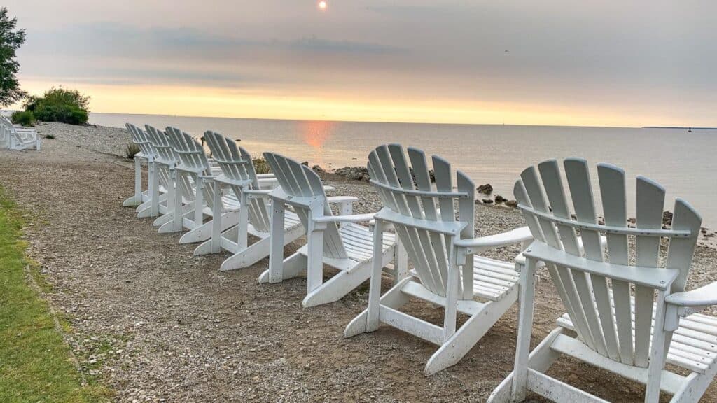 adirondack chairs on the beach